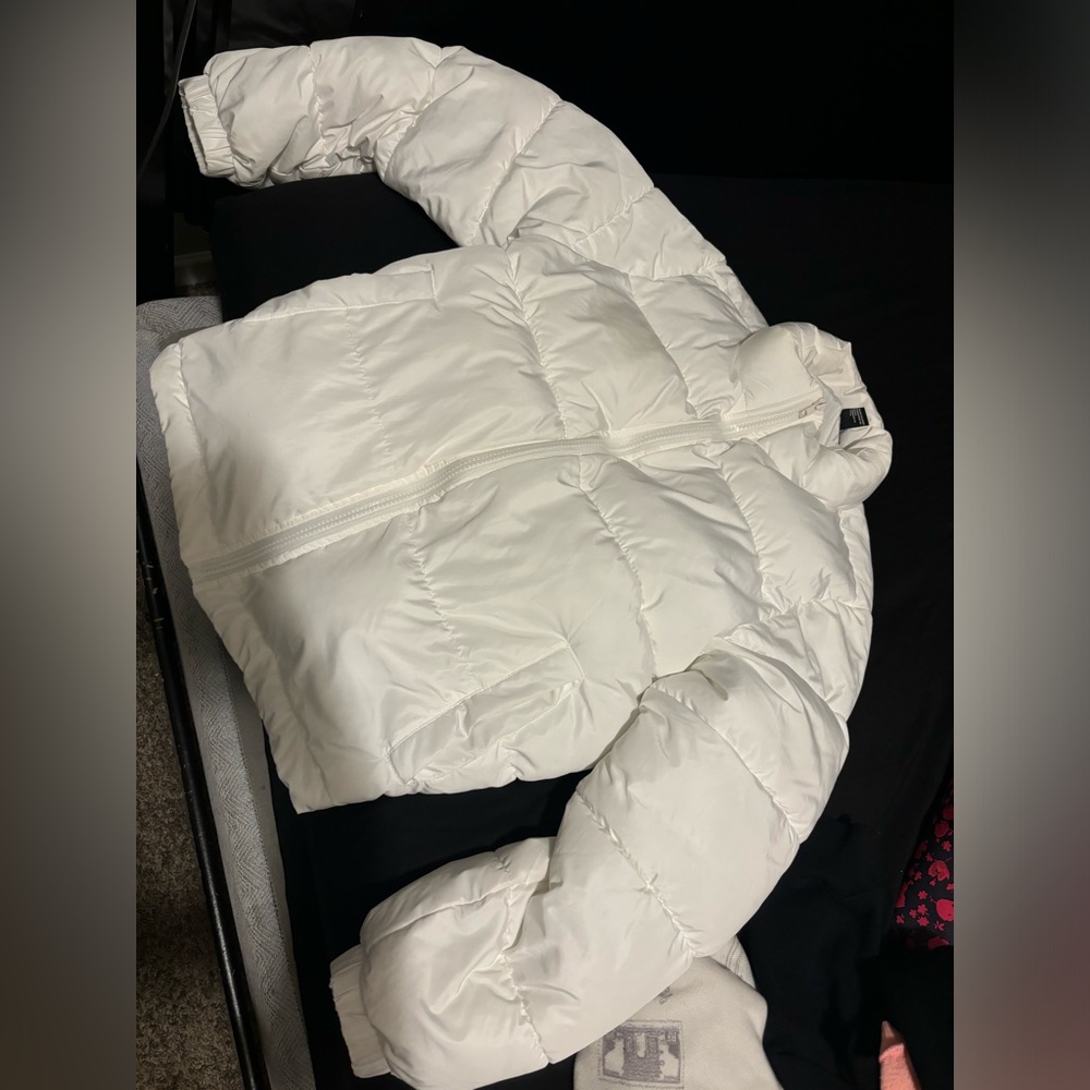 White puffer coat.